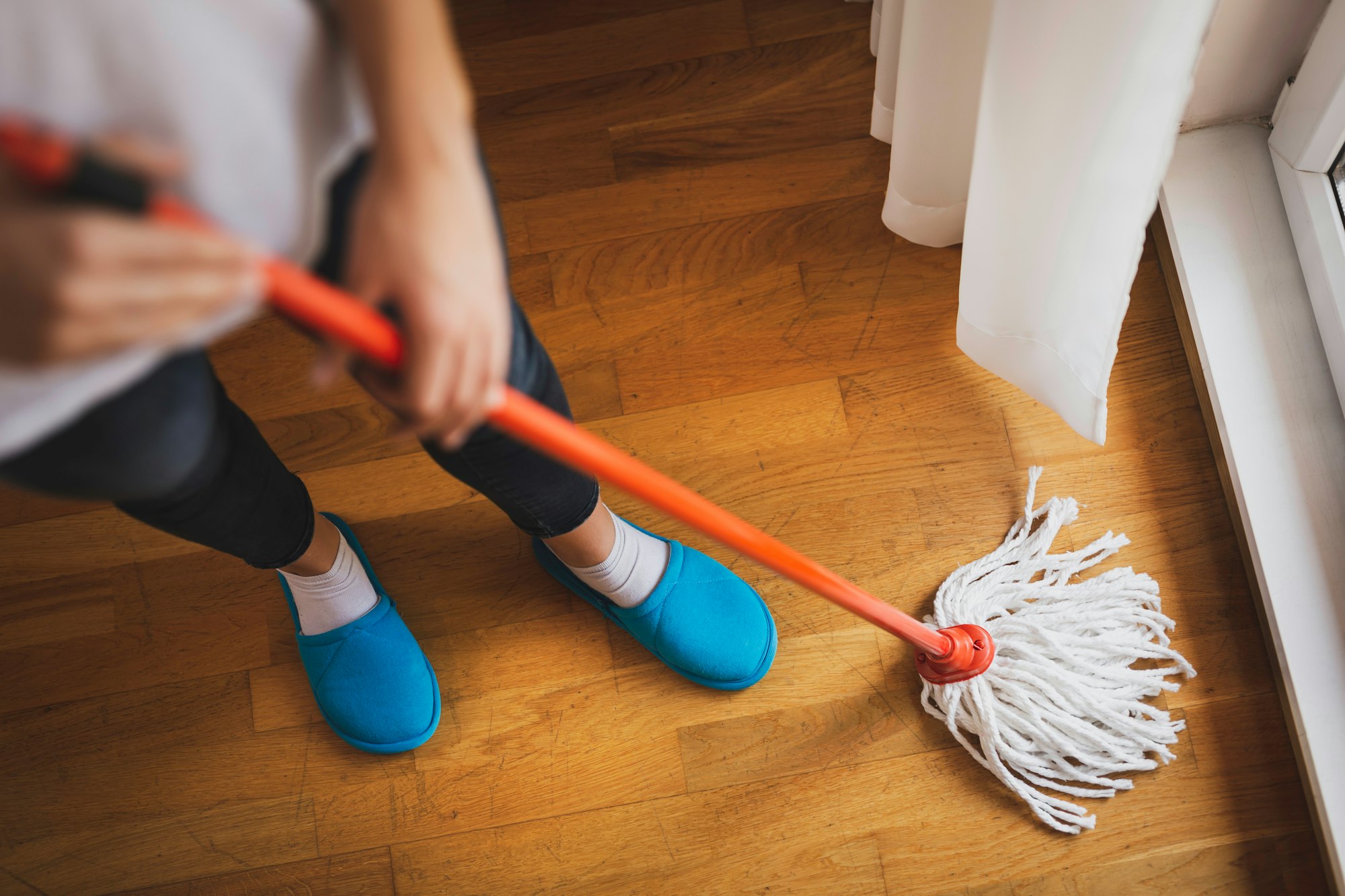 Woman cleaning the floor